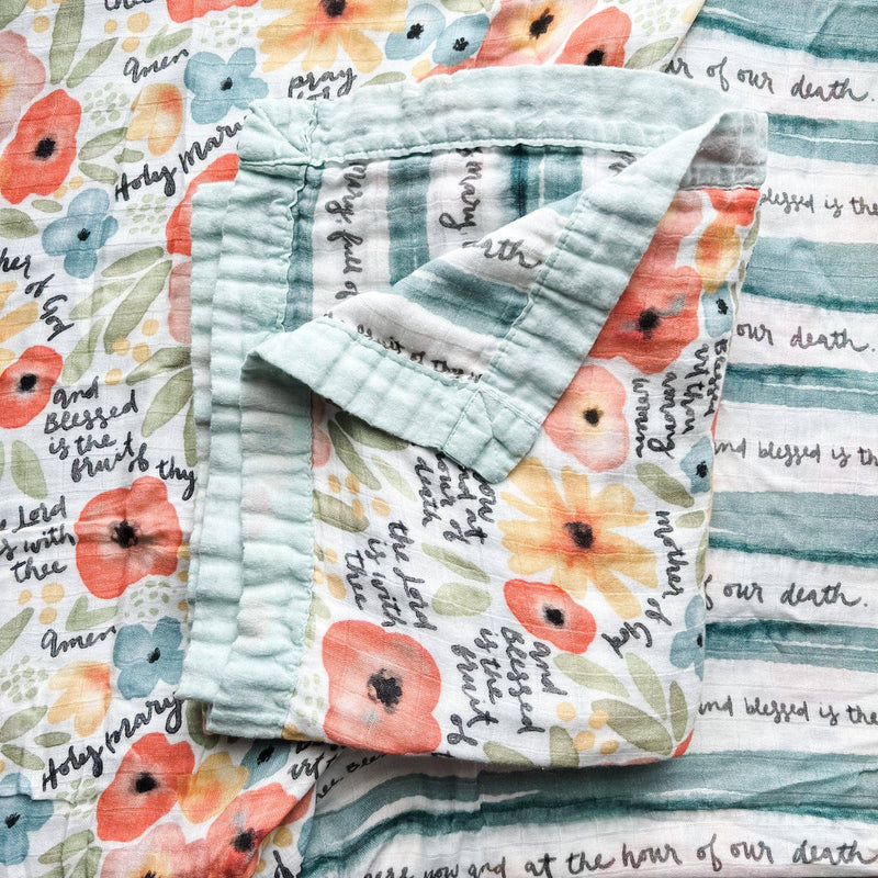 Floral patterned fabric with text on a striped background